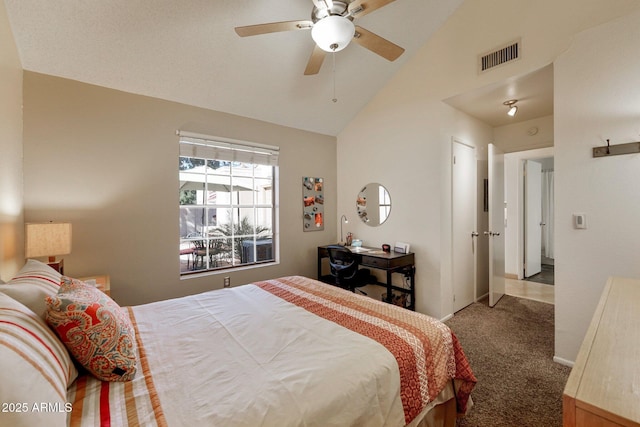 carpeted bedroom featuring ceiling fan and vaulted ceiling