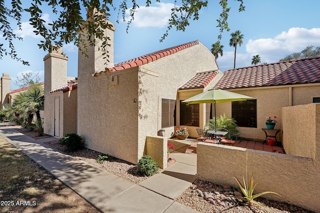 view of front of house featuring a patio area