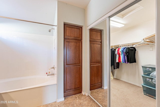 bathroom featuring a tub