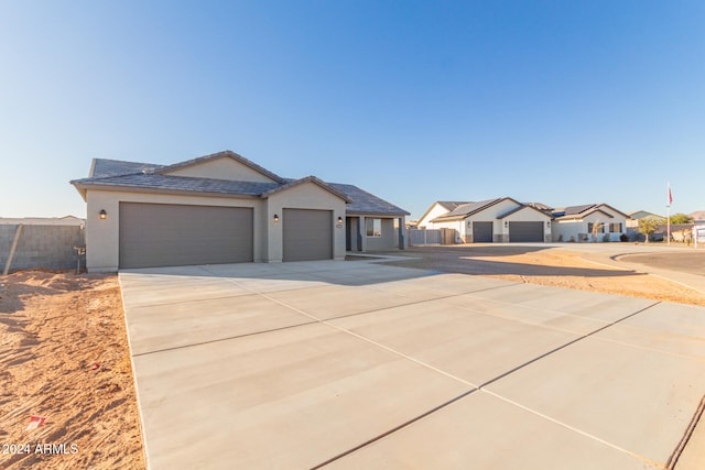 single story home with a garage