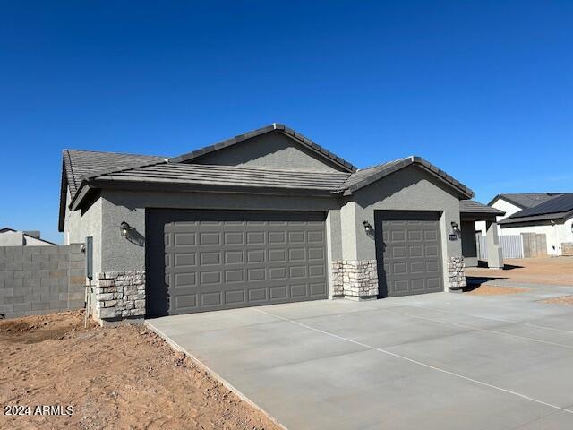 view of property exterior featuring a garage