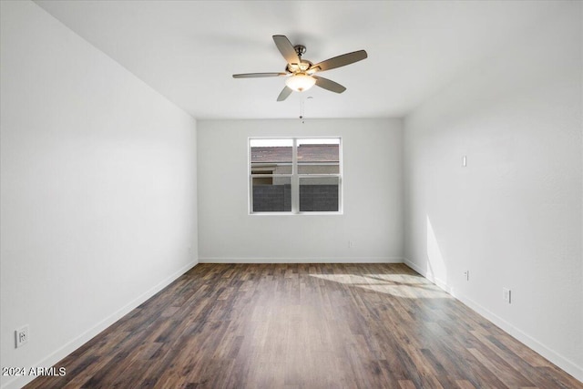 empty room with hardwood / wood-style flooring and ceiling fan