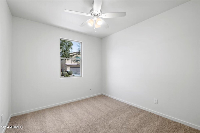 carpeted empty room with ceiling fan