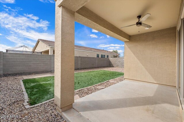 view of patio with ceiling fan