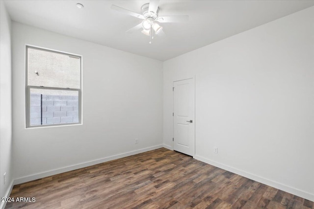 empty room with wood-type flooring and ceiling fan