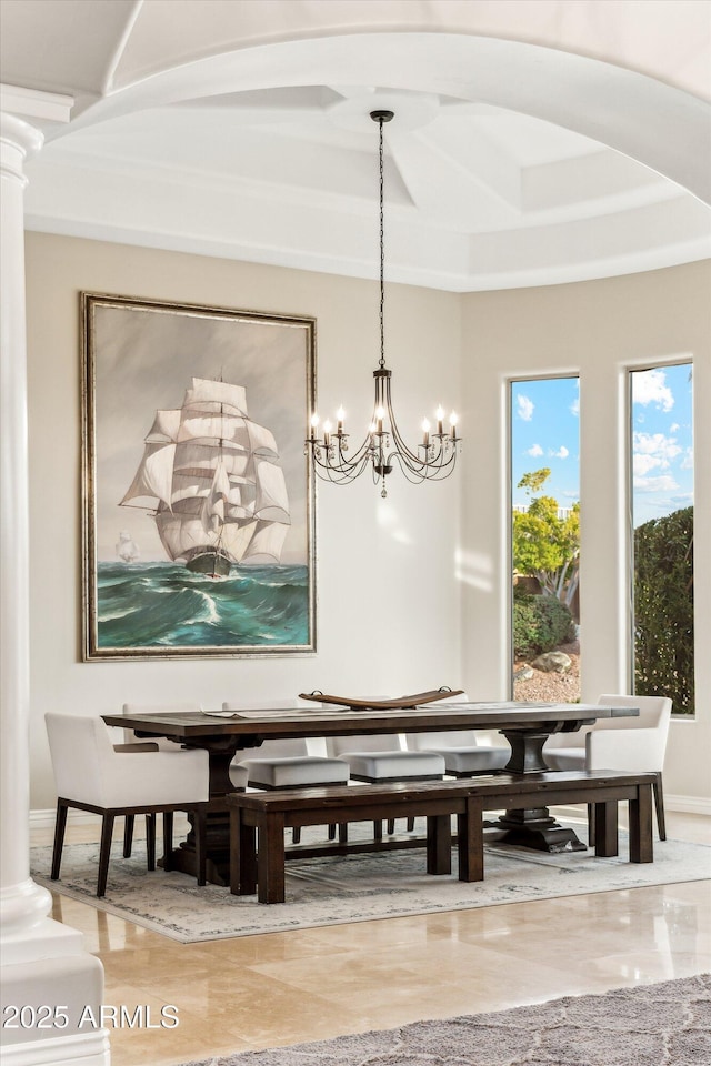 dining room with ornate columns