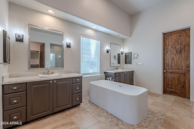 7845 E Dynamite Blvd, Scottsdale, AZ 85266 - bathroom with a freestanding tub, two vanities, and recessed lighting