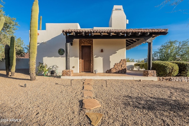 7845 E Dynamite Blvd, Scottsdale, AZ 85266 - southwest-style home featuring stucco siding and a chimney