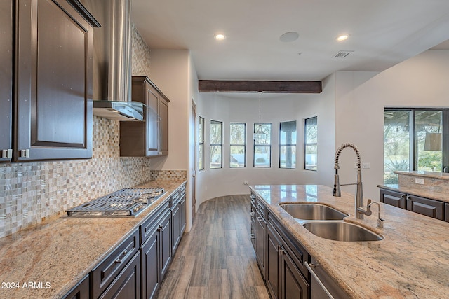 kitchen with sink, hanging light fixtures, dark hardwood / wood-style flooring, beamed ceiling, and dark brown cabinets