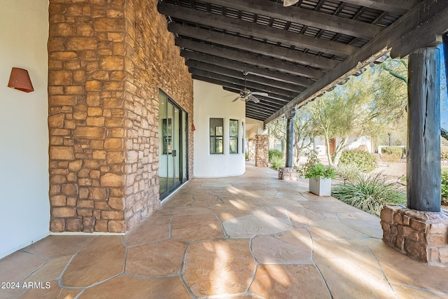 view of patio / terrace featuring ceiling fan