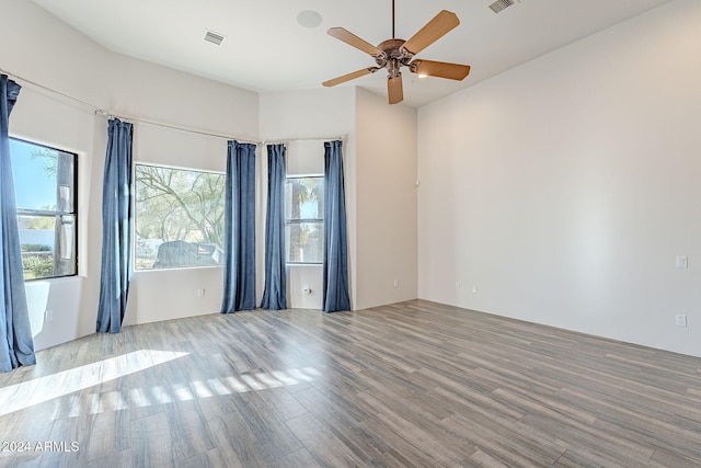 7845 E Dynamite Blvd, Scottsdale, AZ 85266 - empty room with wood finished floors and a ceiling fan