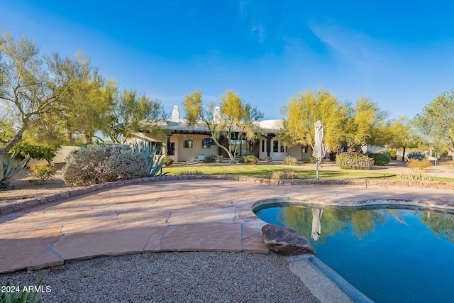 7845 E Dynamite Blvd, Scottsdale, AZ 85266 - swimming pool with a yard and a patio area