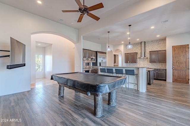 playroom with ceiling fan, hardwood / wood-style floors, and pool table