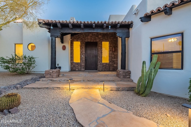 7845 E Dynamite Blvd, Scottsdale, AZ 85266 - property entrance featuring a tiled roof and stucco siding