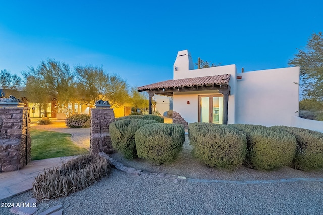 7845 E Dynamite Blvd, Scottsdale, AZ 85266 - back of property featuring stucco siding and a chimney