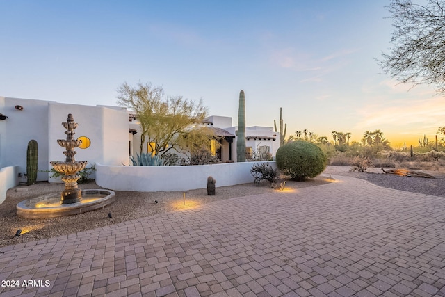 view of property exterior at dusk