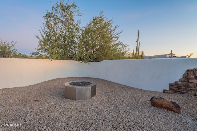 exterior space with a fire pit