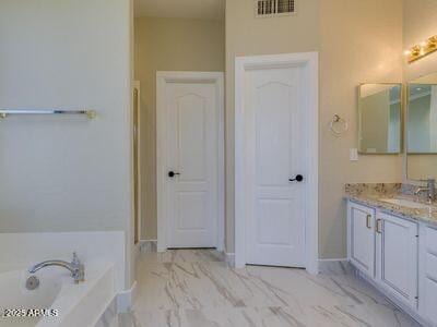 3634 N Desert Oasis, Mesa, AZ 85207 - full bath featuring vanity, a bath, and marble look tiles