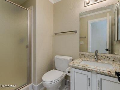 3634 N Desert Oasis, Mesa, AZ 85207 - full bath featuring vanity, a shower stall, toilet, and baseboards