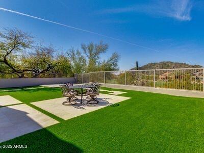 3634 N Desert Oasis, Mesa, AZ 85207 - view of yard with a patio and a mountain view