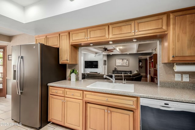 kitchen featuring light tile patterned flooring, stainless steel fridge with ice dispenser, a sink, and dishwashing machine