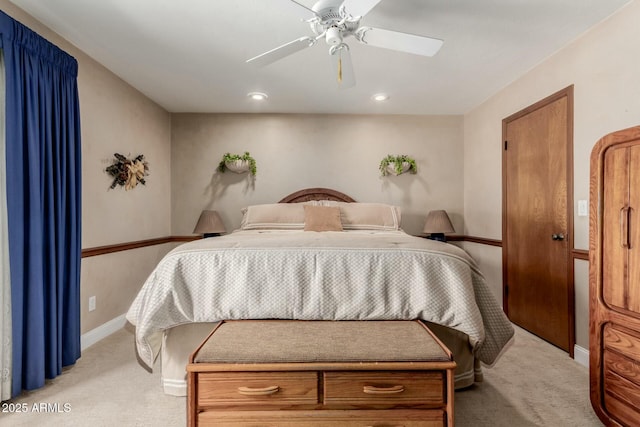 bedroom with light carpet, ceiling fan, baseboards, and recessed lighting