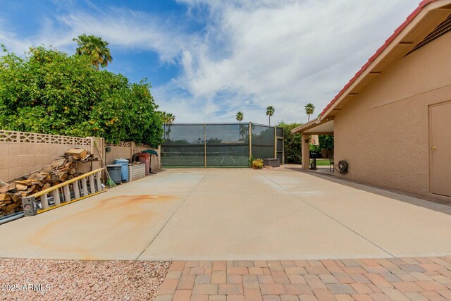 view of patio / terrace with fence