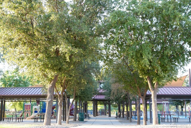 view of property's community featuring a playground and a gazebo