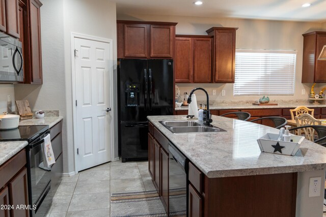 tiled dining room with ceiling fan