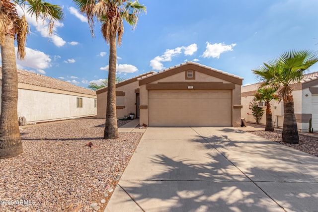 1507 W Mesquite Ave, Apache Junction, AZ 85120 - view of front of property with stucco siding, concrete driveway, an attached garage, and a tiled roof