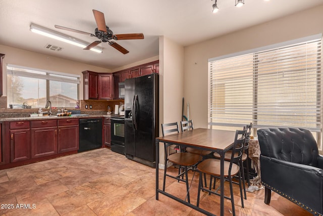 1507 W Mesquite Ave, Apache Junction, AZ 85120 - kitchen with black appliances, ceiling fan, dark brown cabinets, and a sink