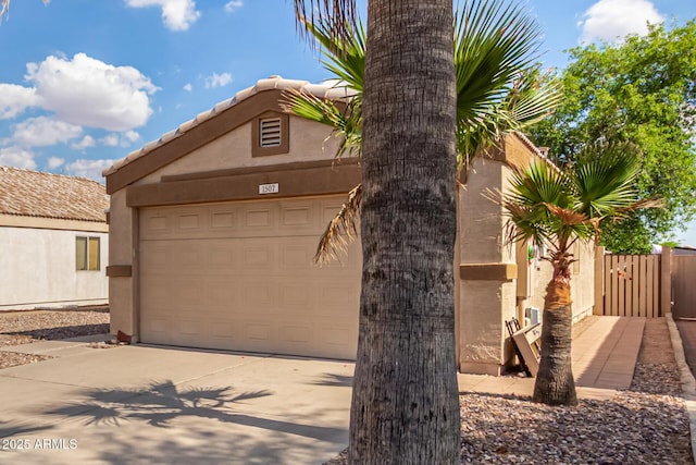 1507 W Mesquite Ave, Apache Junction, AZ 85120 - garage featuring concrete driveway