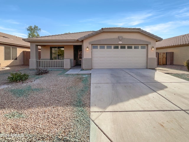 ranch-style home featuring a garage