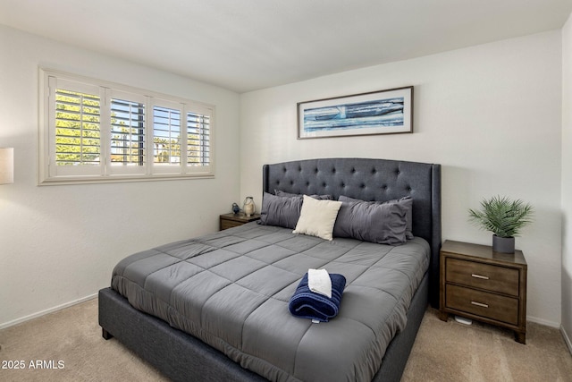 bedroom with light carpet