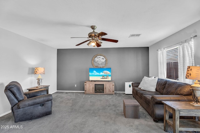 2412 W Camp River Rd, San Tan Valley, AZ 85144 - carpeted living area featuring baseboards, a ceiling fan, and visible vents