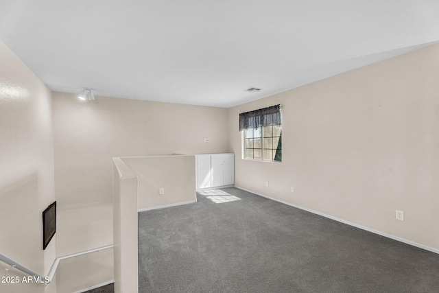 2412 W Camp River Rd, San Tan Valley, AZ 85144 - carpeted spare room featuring baseboards and visible vents