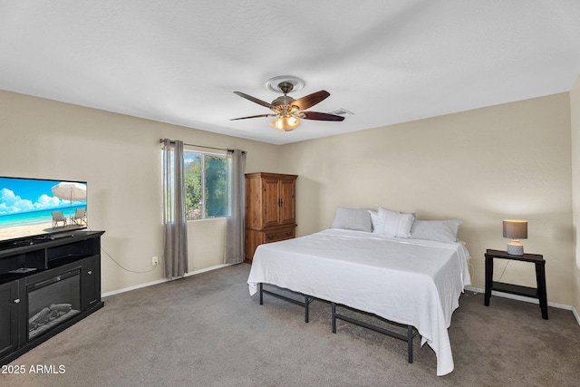 2412 W Camp River Rd, San Tan Valley, AZ 85144 - carpeted bedroom with baseboards, a ceiling fan, and visible vents