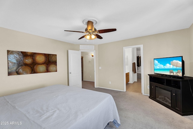 2412 W Camp River Rd, San Tan Valley, AZ 85144 - carpeted bedroom with a spacious closet, ceiling fan, baseboards, and visible vents