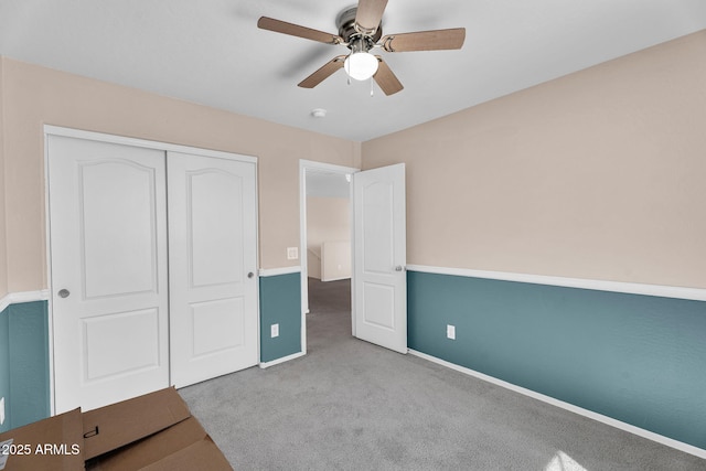 2412 W Camp River Rd, San Tan Valley, AZ 85144 - unfurnished bedroom featuring a ceiling fan, baseboards, carpet, and a closet