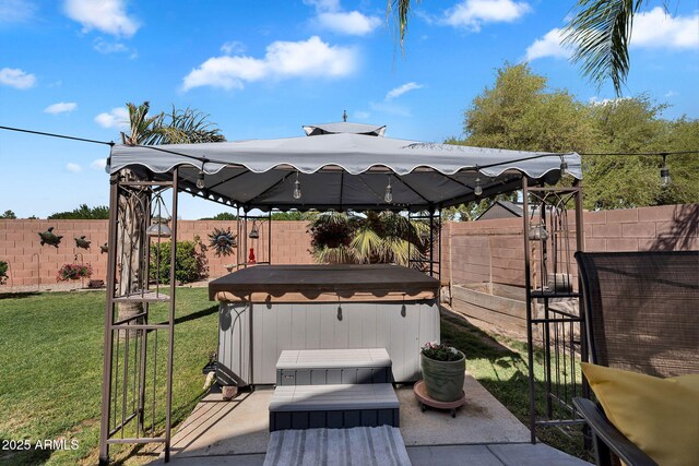 2412 W Camp River Rd, San Tan Valley, AZ 85144 - view of patio / terrace featuring a gazebo, a hot tub, and a fenced backyard