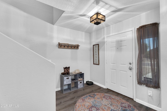 2412 W Camp River Rd, San Tan Valley, AZ 85144 - entrance foyer featuring baseboards and wood finished floors