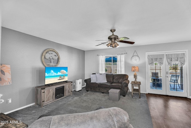 2412 W Camp River Rd, San Tan Valley, AZ 85144 - living room with ceiling fan, baseboards, and carpet flooring