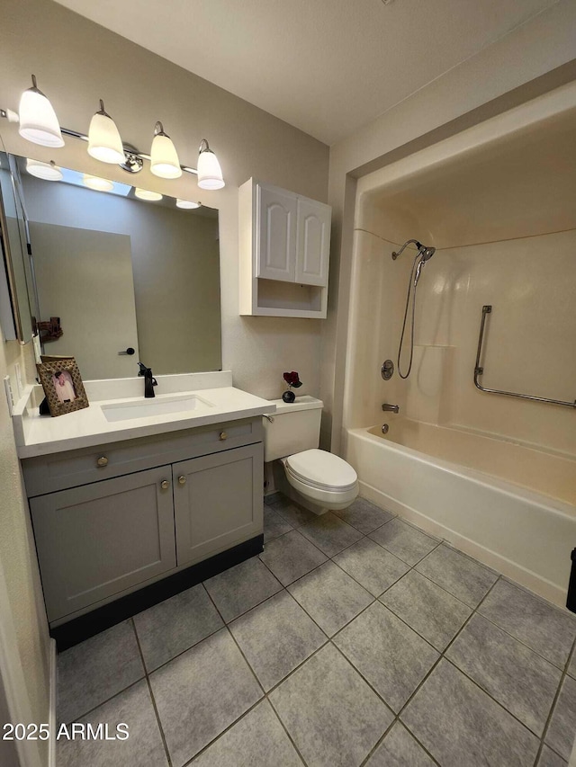 full bath featuring tile patterned floors, shower / bath combination, vanity, and toilet