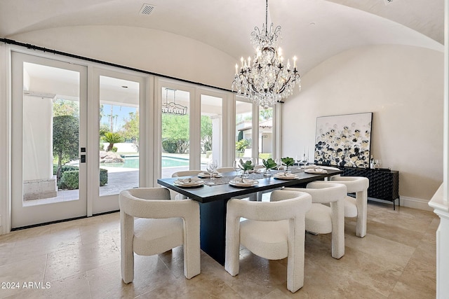 dining room with vaulted ceiling, a notable chandelier, and brick ceiling