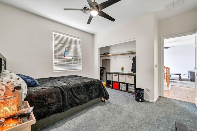 bedroom featuring carpet, a ceiling fan, baseboards, and a closet