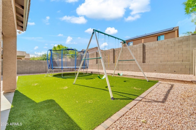 communal playground with a trampoline