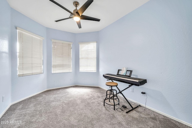 bedroom with carpet flooring, baseboards, and ceiling fan
