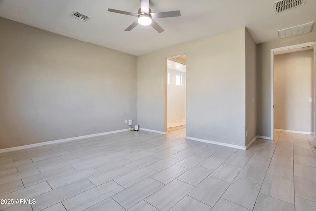 spare room featuring ceiling fan