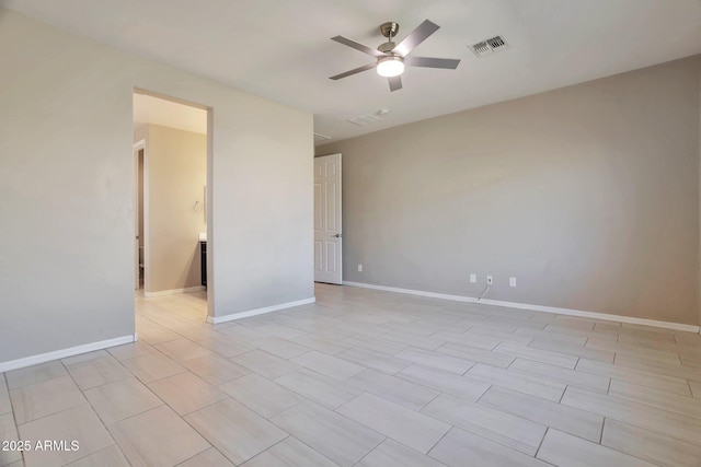 unfurnished room with ceiling fan