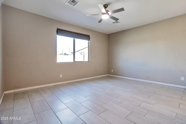 empty room featuring ceiling fan